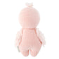 Cuddle + Kind’s Baby Flamingo is a pink, heirloom-quality plush doll with short arms, a round head, and a small tuft. Handcrafted from soft Peruvian cotton yarn, it offers lasting charm and sweet cuddles. Shown here from the back.