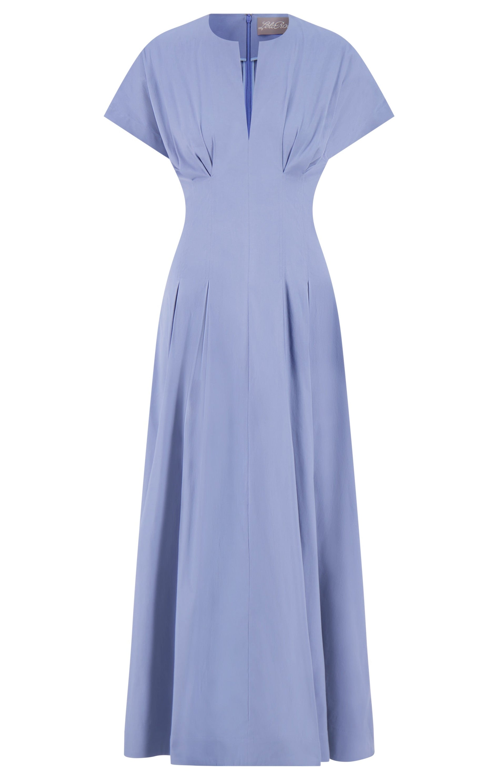 The Smocked Back Dress by Lela Rose features light blue cotton poplin, a pleat-tailored bodice, fitted waist, small V-shaped neckline, and short sleeves.