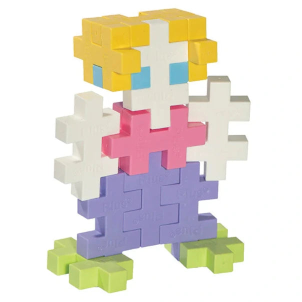 The Plus Plus Tube - BIG 15 Piece - Pastel is a STEM toy of interlocking plastic blocks. It features yellow hair, blue eyes, a pink shirt, purple pants, and green feet on a white background—great for creative play and fine motor skills.