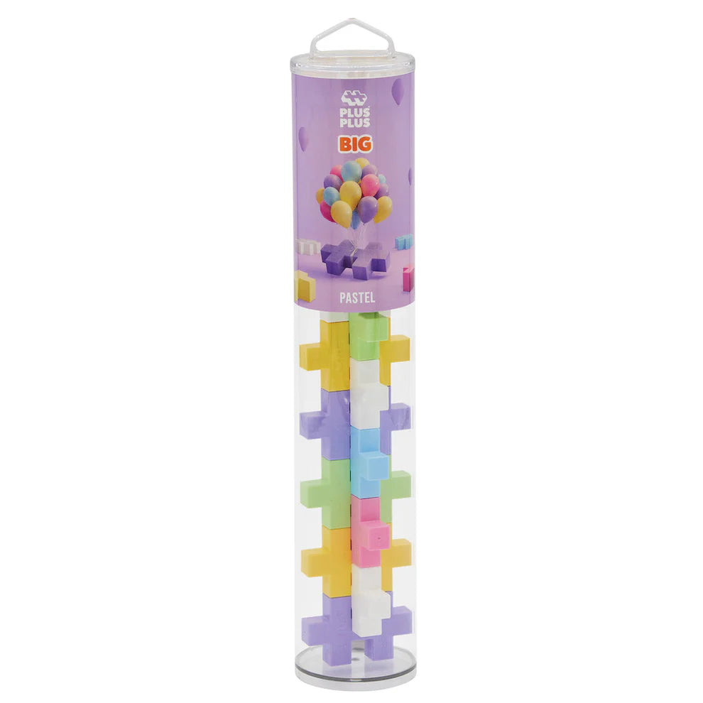 The Plus Plus Tube - BIG 15 Piece - Pastel is a clear cylindrical container with pastel-colored building blocks. The label shows the Plus Plus brand and images of assembled blocks, making it an engaging STEM toy for creative play.