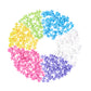 The Plus Plus Tube - 240 Piece - Pastel Mix features interlocking plastic pieces in pastel green, blue, white, purple, pink, and yellow—an ideal STEM toy for inspiring creative play.