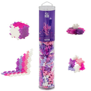 The Plus Plus Tube - 240 Piece - Glitter Mix includes pink, purple, and white building blocks for creative play and fine motor skill development, letting kids build a variety of shapes and designs.