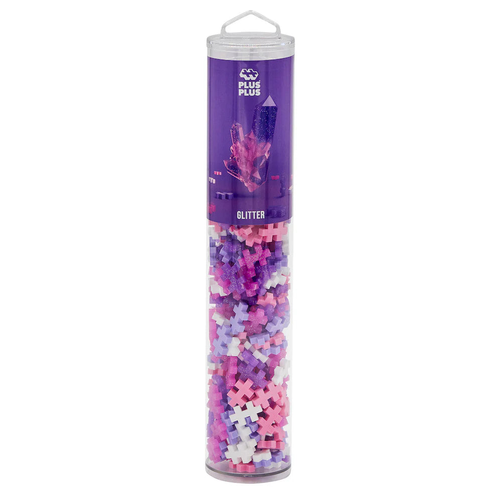 The Plus-Plus Tube - 240 Piece - Glitter Mix features glittery pink, purple, white, and blue building blocks—ideal for creative play and developing fine motor skills.