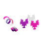 The Plus Plus Tube - 240 Piece - Glitter Mix features colorful interlocking pieces in purple, pink, and white that can be assembled into rings and heart shapes, inspiring creative play and enhancing fine motor skills.