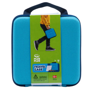 The Plus Plus Travel Case is shown in its packaging with a handle, featuring an image of someone carrying it and highlighting its use as a creative STEM toy on the front.