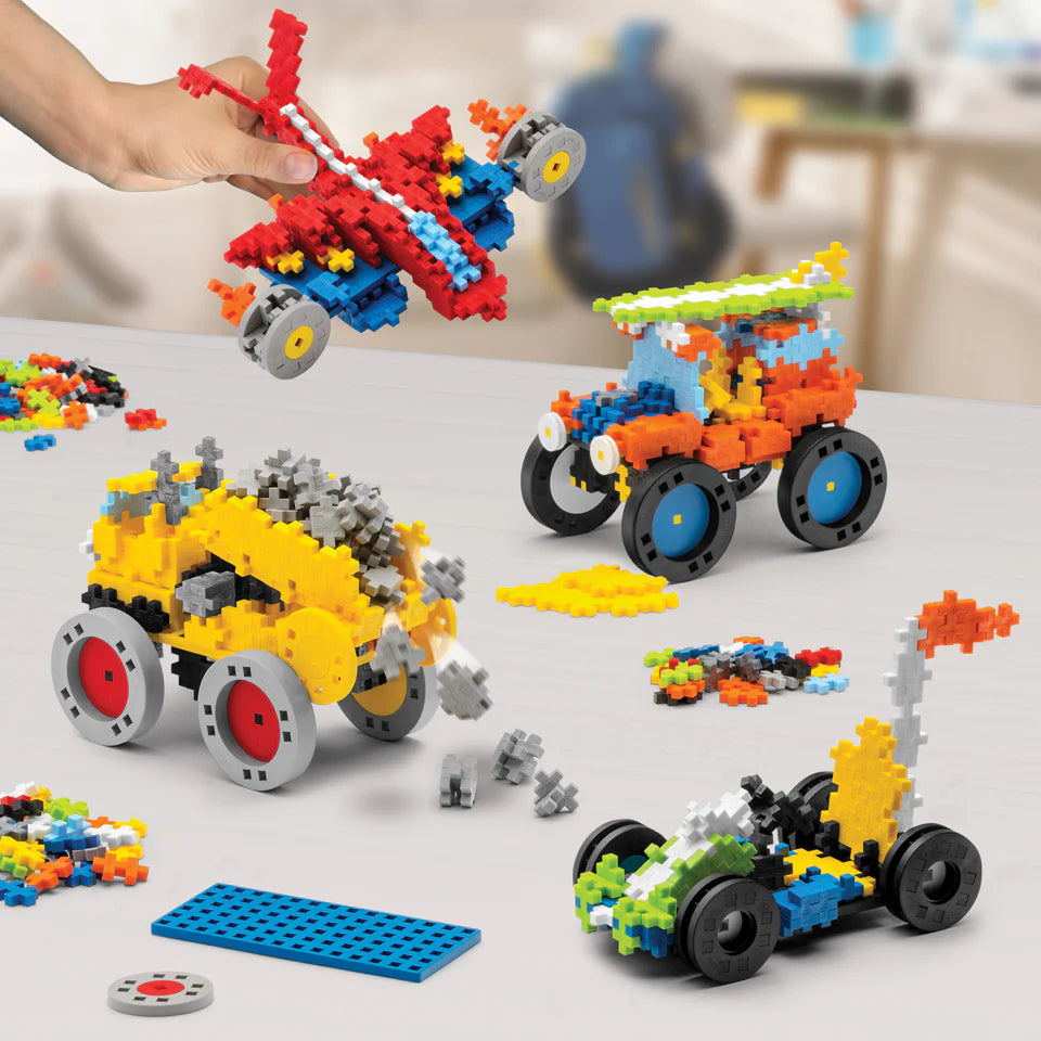 The Plus Plus GO! Learn To Build Vehicles - Super Set features colorful plastic blocks to create a car, plane, and racecar—a hands-on STEM toy for creative play and vehicle building.