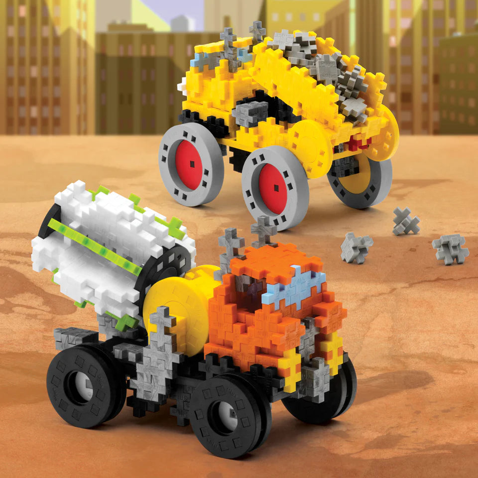 The Plus Plus GO! Learn To Build Vehicles - Super Set lets kids build a yellow car and orange cement mixer from interlocking bricks, inspiring creative play and hands-on learning on a desert surface with a cityscape backdrop.