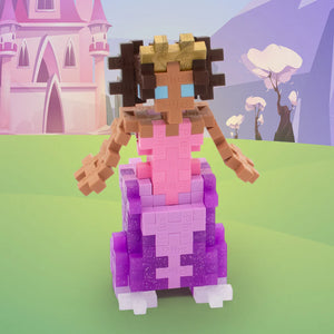 The Plus Plus Tube - Princess lets kids build a princess in a pink and purple dress with interlocking blocks, inspiring creative play and fine motor skills—perfect with castles and trees outdoors.