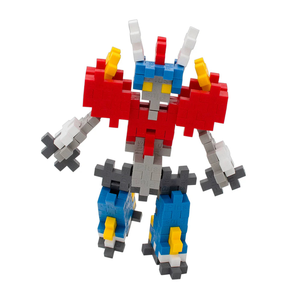 The Plus Plus Tube - Mecha Bot is a colorful robot figure built from interlocking plastic bricks in red, blue, yellow, white, and gray—ideal for creative play and building fine motor skills.
