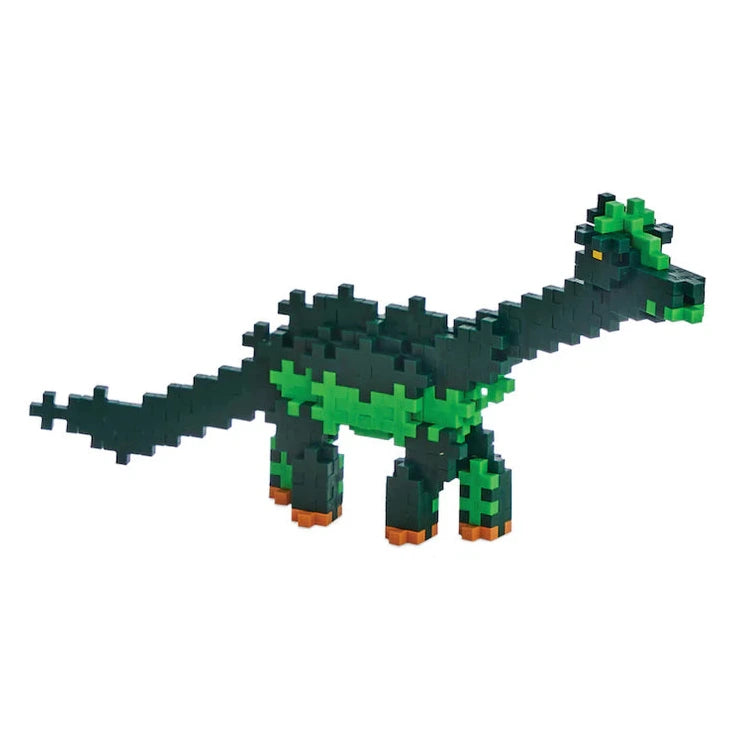 The Plus Plus Learn To Build - Dinosaurs set features interlocking green and brown blocks and includes an illustrated guidebook for step-by-step dinosaur building.