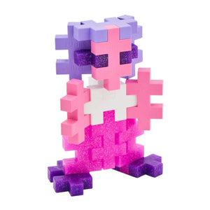 The Plus-Plus BIG 15 Piece Tube - Glitter is a creative set of interlocking blocks in pink, purple, and white—perfect for building fun abstract characters and ideal for fans of 3-D construction toys.