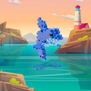 A pixelated blue dolphin leaps between rocky cliffs, built with the Plus Plus Tube - Dolphin set, while a lighthouse stands in the distance under a pink-orange sky—a perfect build for sea creature fans.