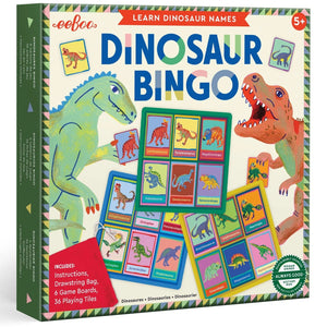 The Eeboo Dinosaur Bingo game features illustrated prehistoric dinosaurs, game boards, tiles, and instructions for learning dinosaur names, all in a colorful box with fun accessories.