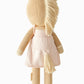 Kelsie the Pony by Cuddle + Kind—a regular 20" knitted horse plush toy with a cream mane and tail, dressed in a pale pink dress and shown from the back against a plain background—is perfect inspiration for creating a beautiful birthday gift.