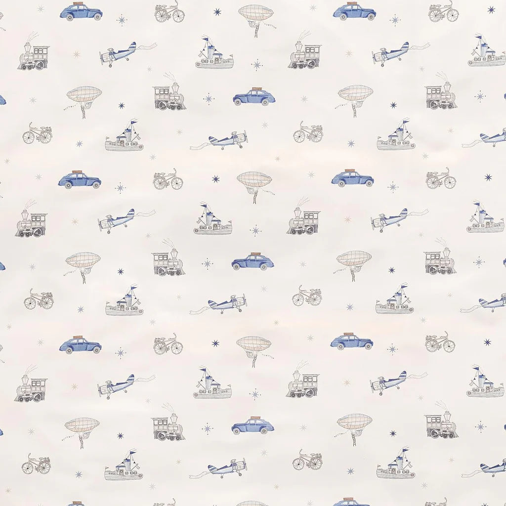 The Transit Treasures Crib Sheet by Gooselings features vintage cars, bicycles, airplanes, hot air balloons, and boats on a light background in soft cotton sateen with OEKO-TEX certified materials, inspired by classic crib sheet designs.