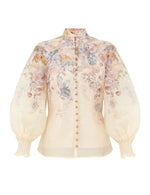 Zimmermann Ascent Blouse: sheer, long-sleeve, pastel floral print with high neck, fabric-covered buttons, and gathered cuffs.