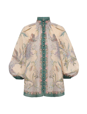 Zimmermann Indra Billow Blouse: off-white, long sleeves, puffed shoulders, floral embroidery, green trim, and front buttons.