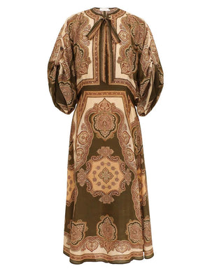 The Mahon Tunic Midi Dress by Zimmermann features brown and beige paisley silk, voluminous sleeves, and a tied neckline—perfect for summer 2026.
