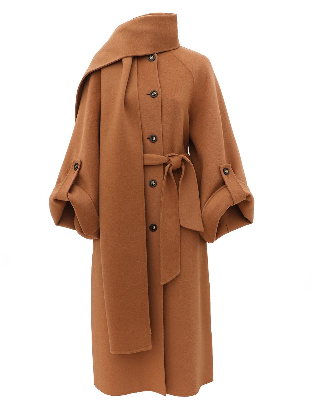 The Valiant Wool Scarf Coat by Zimmermann is a camel design with large buttons, a matching belt, wide sleeves, and a scarf draped at the collar.
