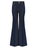 Zimmermann Slim Flare Jean in Harbour Blue denim with high waist, front and back pockets, and yellow stitching, shown on a white background.