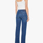 A woman stands facing away against a plain white background, wearing Mother’s Kick It blue high-rise straight-leg jeans crafted from recycled stretch denim with a 32-inch inseam, paired with a white tank top and beige heels.