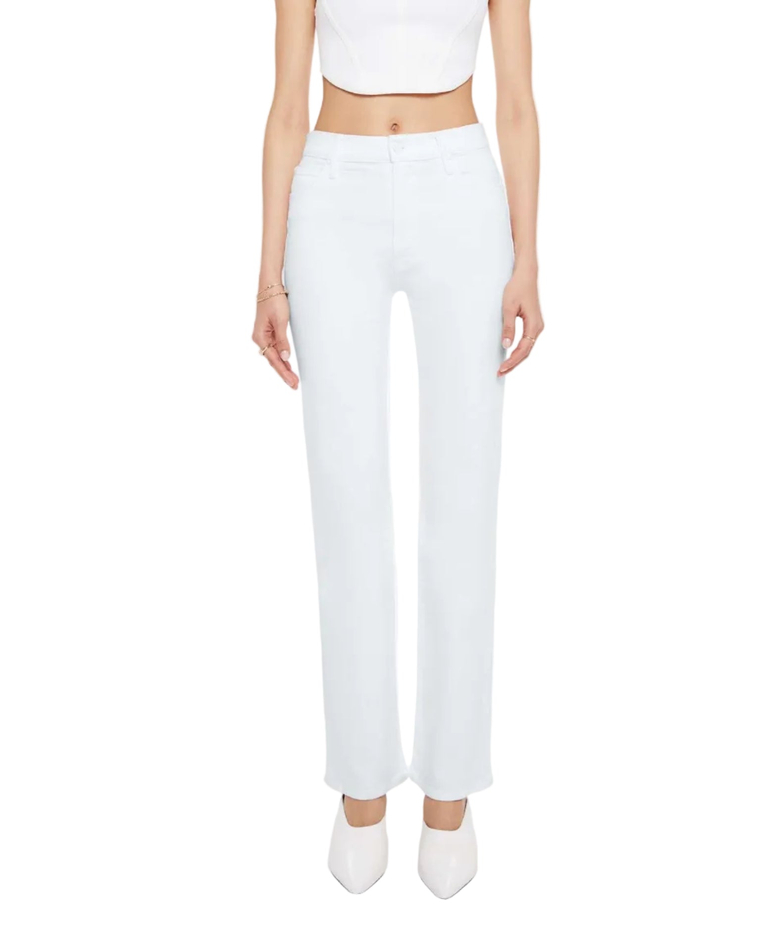 A person is wearing the Mother Kick It high-rise straight-leg jeans in a light blue wash, styled with a white crop top and white pointed shoes, standing facing forward against a plain background.