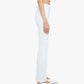 A person wearing the Mother Kick It high-rise straight-leg jeans, crafted from recycled stretch denim in a light mid-blue wash, pairs them with a white crop top and white heeled shoes while standing in profile against a plain white background.