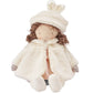 The Glad Dreams Elsie Doll by Bunnies By the Bay features brown curls, a white furry bunny-ear hat, and matching coat, sitting upright against a white background—an adorable keepsake for any wardrobe box.