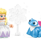 A blonde LEGO DUPLO figure in a white dress stands next to Elsa, Bruni the blue dragon, and Frozen 2-inspired accessories from the LEGO® DUPLO® Elsa & Bruni in the Enchanted Forest by Legos - Toyhouse.