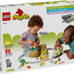 A child and adult play with the LEGO® DUPLO® Interactive Adventure Train by Legos - Toyhouse; the box shows set pieces, fun activities, and info about learning through play with this engaging train toy for toddlers.