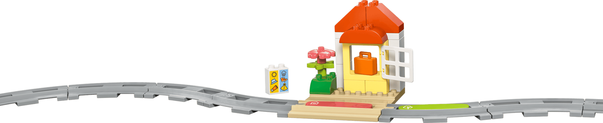 The LEGO® DUPLO® Interactive Adventure Train by Legos - Toyhouse features a small house with a red roof beside a curved gray track, plus a flower, stickered block, and two colored tiles for toddlers to explore.