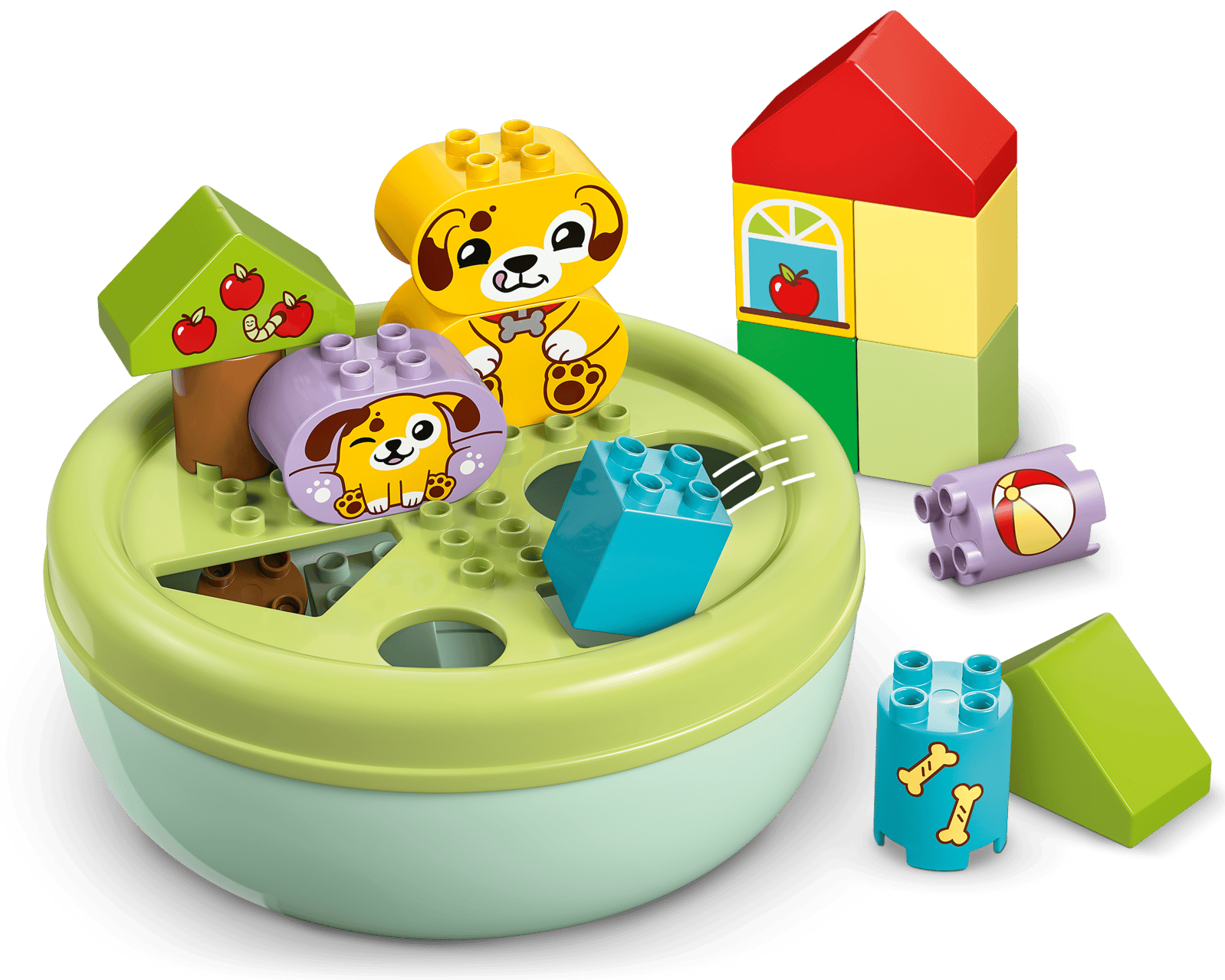 The LEGO® DUPLO® Shape Sorter: Puppy House by Legos - Toyhouse features colorful blocks, animal and fruit pieces arranged in and around a green round sorter, making it a fun fine motor skills toy.