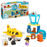 The LEGO® DUPLO® First Time at the Airport by Legos - Toyhouse is a fun preschool set with a yellow airplane, control tower, two child figures, suitcases, and a teddy bear—perfect for ages 2 and up.