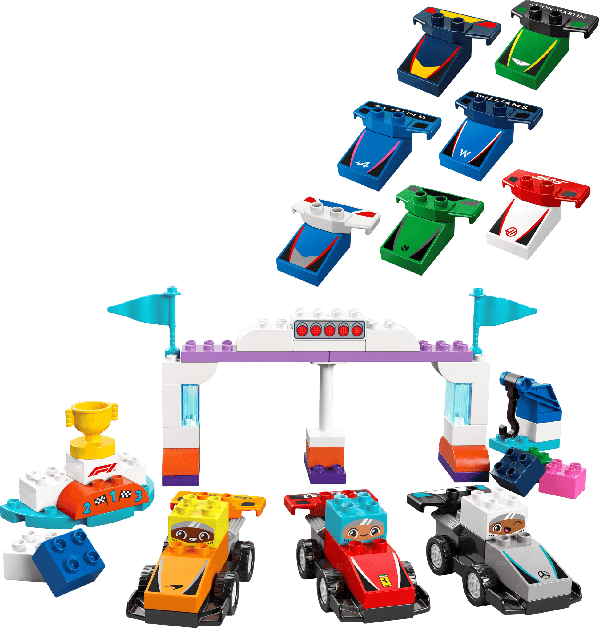 The LEGO® DUPLO® F1® Team Race Cars & Drivers by Legos - Toyhouse includes three assembled cars, mini trophies, a starting gate, and colorful interchangeable car hoods arranged above the scene.