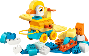 The LEGO® DUPLO® 3in1 Animals on Wheels by Legos - Toyhouse features colorful, wheeled animal toys and loose bricks in blue, white, orange, and yellow—perfect for toddlers who love playful animal adventures.
