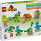 Back of a LEGO® DUPLO® 3in1 Dinosaurs on Wheels box from Legos - Toyhouse, featuring colorful dinosaur toys on wheels, a child at play, and key features highlighted in colored boxes.