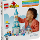 A young child plays with the LEGO® DUPLO® Anna and Elsa's Frozen Castle Party by Legos - Toyhouse, a vibrant toddler castle playset displayed on a colorful product box.