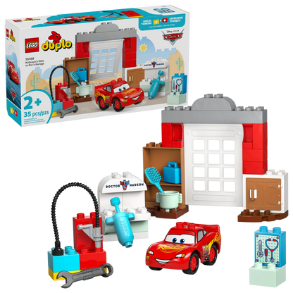 The Legos - Toyhouse LEGO® DUPLO® McQueen's Visit to Doc's Garage playset features Lightning McQueen, a brick-built garage, tools, and accessories, with box included; ideal for ages 2+.