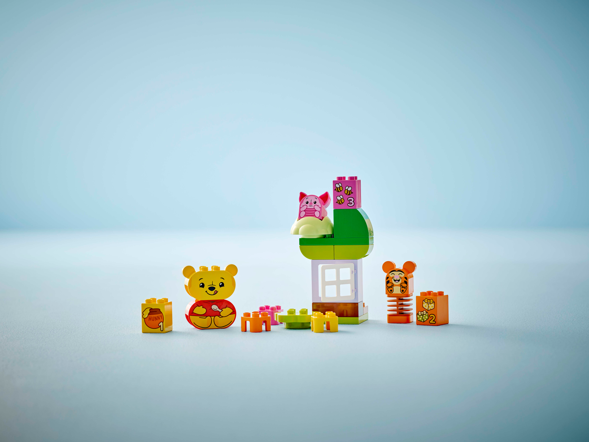 The Legos - Toyhouse LEGO® DUPLO® Disney™ Winnie the Pooh's Birthday Party set features colorful building blocks and animal figures, perfect for educational play and imaginative fun.