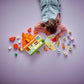 A child plays on a purple floor with the LEGO® DUPLO® Bluey's Family House with Memory Game by Legos - Toyhouse, featuring building blocks, a colorful spinning memory game board, and small toy figures and pieces.