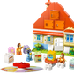The LEGO® DUPLO® Bluey's Family House with Memory Game by Legos - Toyhouse features four cartoon animal figures, large printed blocks, and a round disc for a fun memory game, all on a white background.