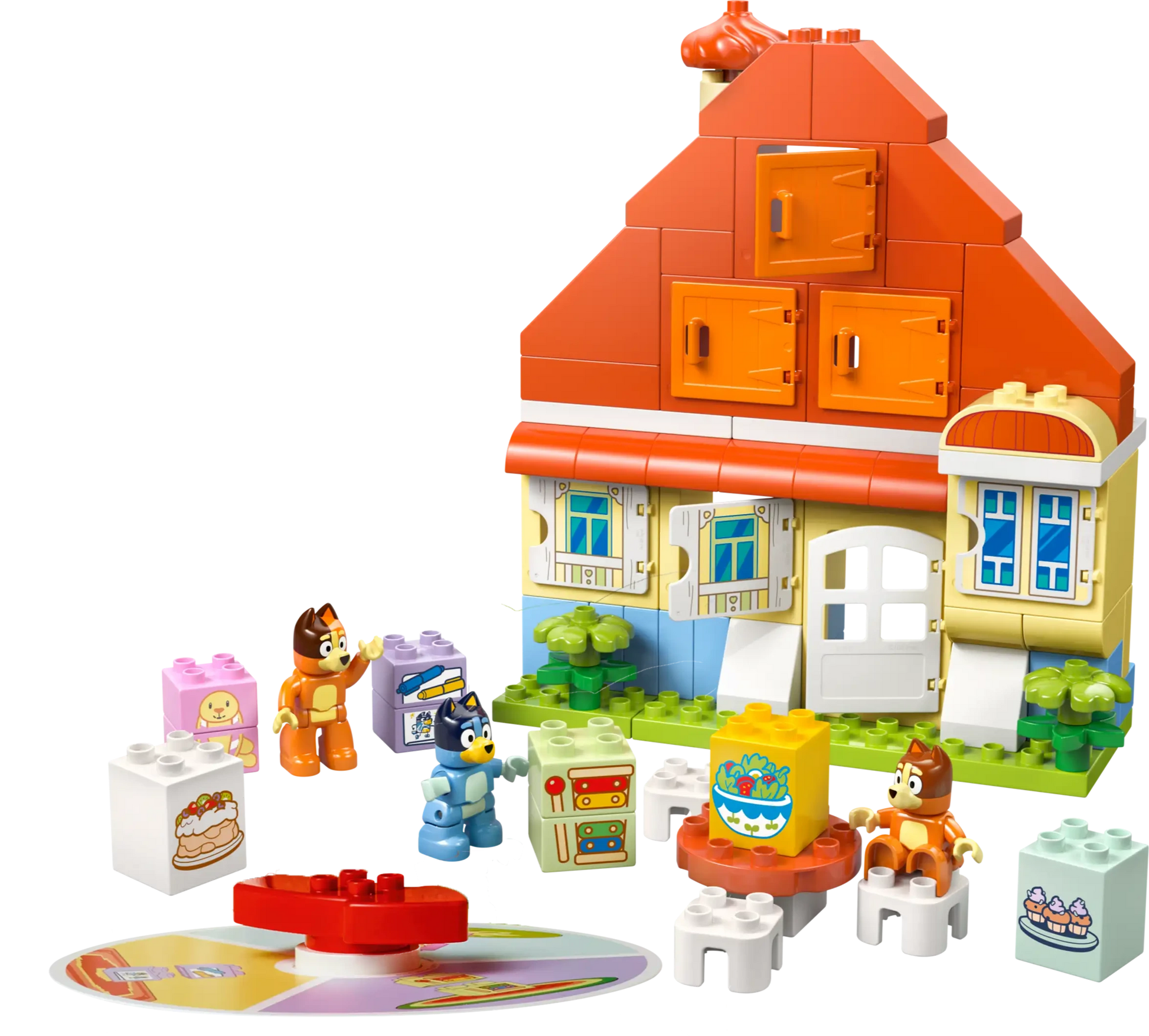 The LEGO® DUPLO® Bluey's Family House with Memory Game by Legos - Toyhouse features four cartoon animal figures, large printed blocks, and a round disc for a fun memory game, all on a white background.