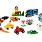 A variety of colorful creations built with LEGO® Classic Medium Creative Brick Box by Legos - Toyhouse, including vehicles, animals, a house, a train, flowers, and fantasy figures, are displayed on a white background.