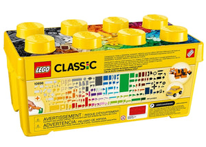 The LEGO® Classic Medium Creative Brick Box by Legos - Toyhouse features 484 pieces in a yellow storage box with a transparent lid. Set number 10696, ideal for creative building and vehicle play. Suitable for ages 4 and up.