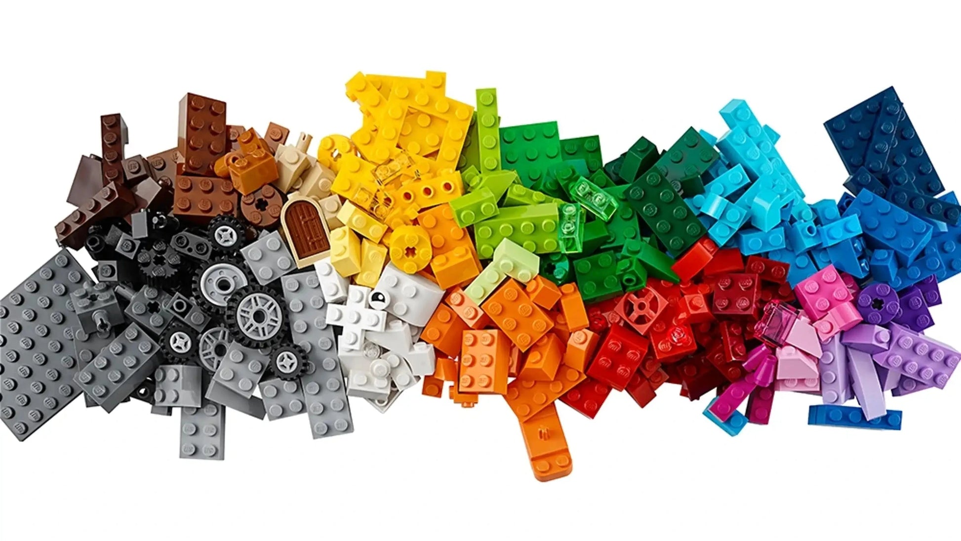The LEGO® Classic Medium Creative Brick Box by Legos - Toyhouse features colorful bricks in a gradient from brown, gray, yellow, green, red, blue to purple on a white background, inspiring creativity and imaginative play.