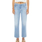 A person stands against a plain white background wearing a white crop top, Mother’s Mid Rise Rambler Zip Ankle Fray jeans with a wide straight leg and frayed hem, and gold sandals.