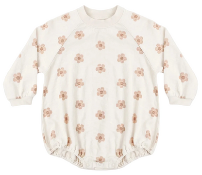 The Rylee & Cru Baby Girls’ Crew Neck Romper features long sleeves and a classic crewneck design, crafted from soft jersey fabric. This cream-colored romper is adorned with a light brown floral pattern and finished with elastic leg openings for extra comfort.