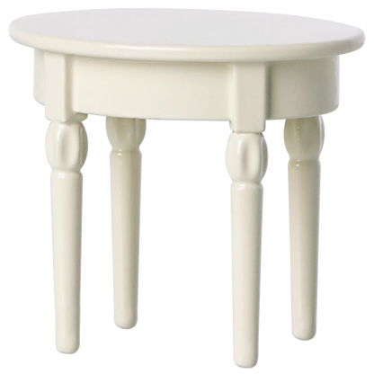 The Maileg Side Table, Mouse is a small, round, white wooden table with four turned legs—ideal for displaying your Maileg mouse castle or serving snacks.