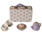 A Maileg Purple Madelaine Afternoon Treat tea set with cupcakes and a suitcase.