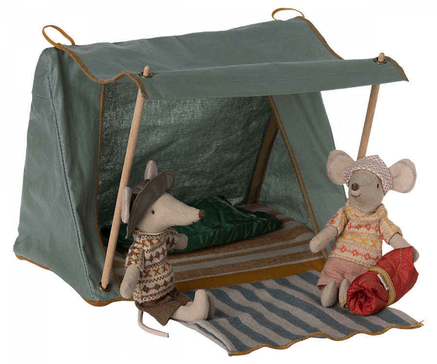 Two plush mice in a Maileg Happy Camper Tent with one sitting inside and the other about to enter.